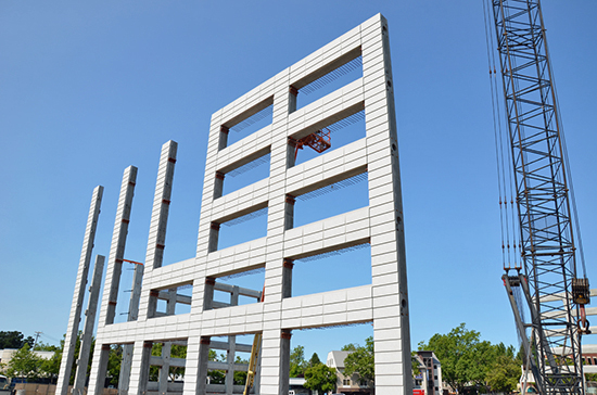 Precast parking components used in structured parking garage construction