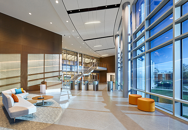 Lobby area with glazing to exterior providing ample light and views at the Saint Gobain CertainTeed North American Headquarters